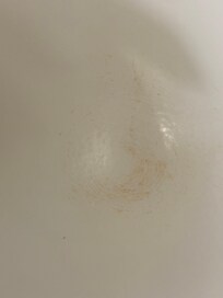 GROSS BROWN STAIN IN BATHTUB