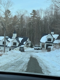 Pulling up to the space. There is a master suite above the garage. 1 of 3 all king size beds.