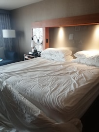 The norm, housekeeping staff just pull the top over over and don't make up the bed properly