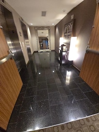 Luxurious details at the elevator by the rooms.