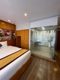 Bedroom with bathroom (there are blinds for privacy(.