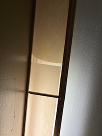 Broken light above bed