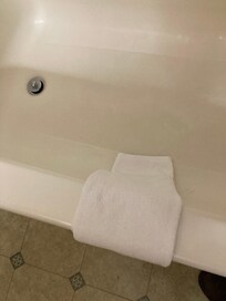 The carefully folded and artfully draped bath mat with a hidden surprise…