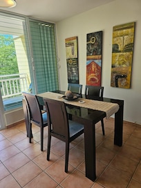 Dinning Area, the legs of this table look like they have had serious water damage.