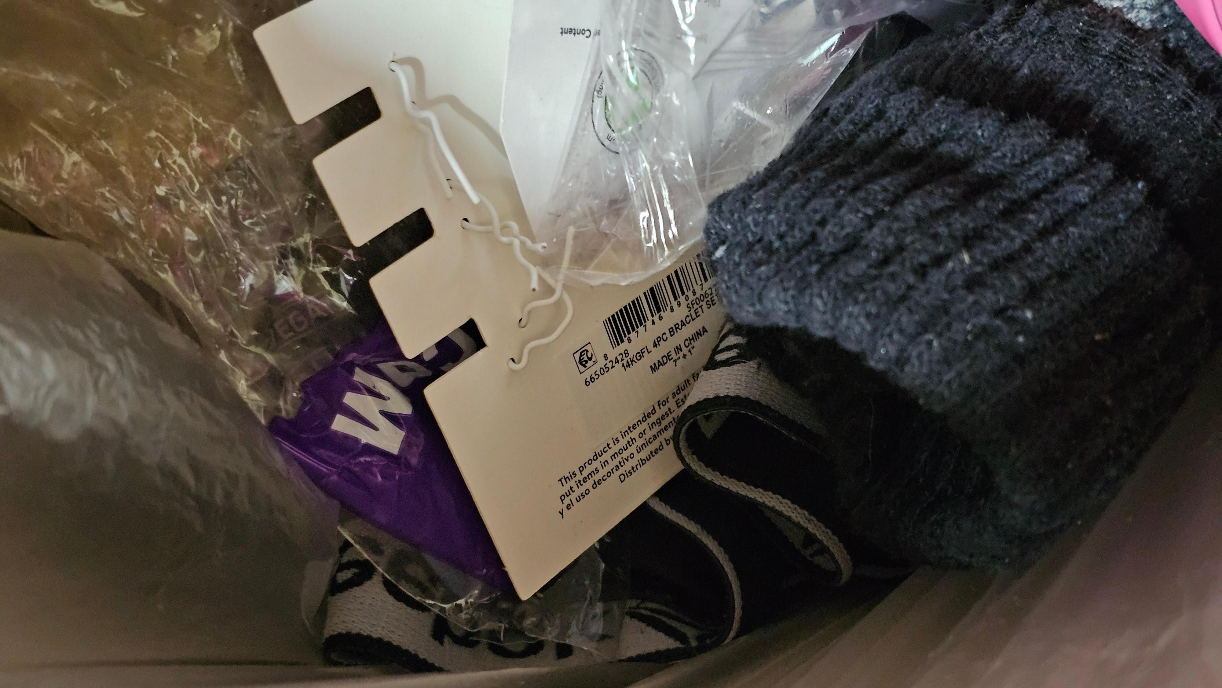 We tossed the old undergarments into the trash. 