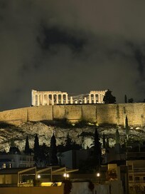 There is no magnification on this photo. The Acropolis is right in front of your face when you look out the window or stand on the balcony.