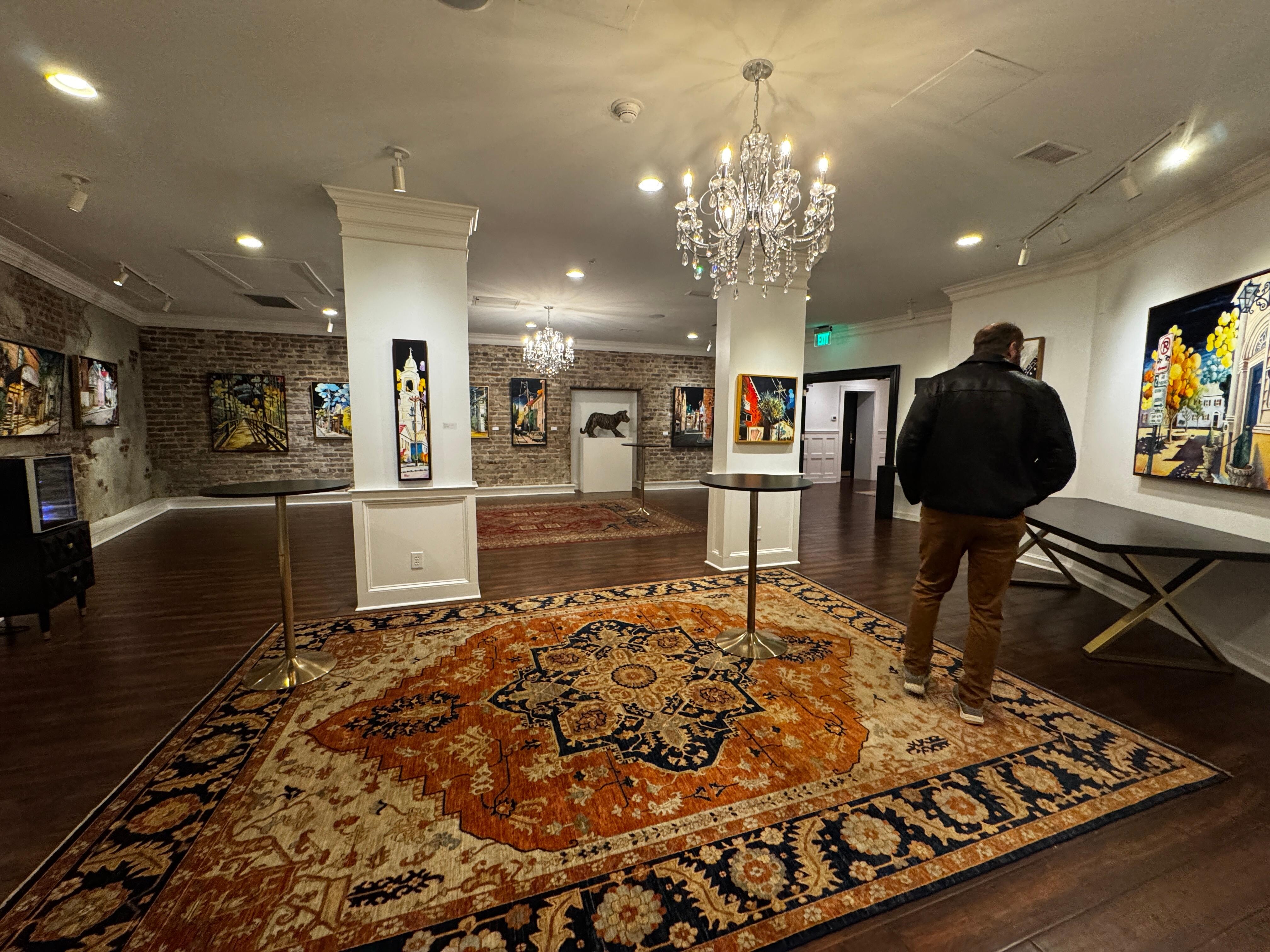 Art gallery with paintings by the artist in residence. 