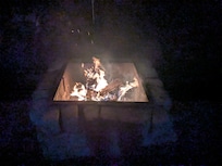 Fire pit right outside home