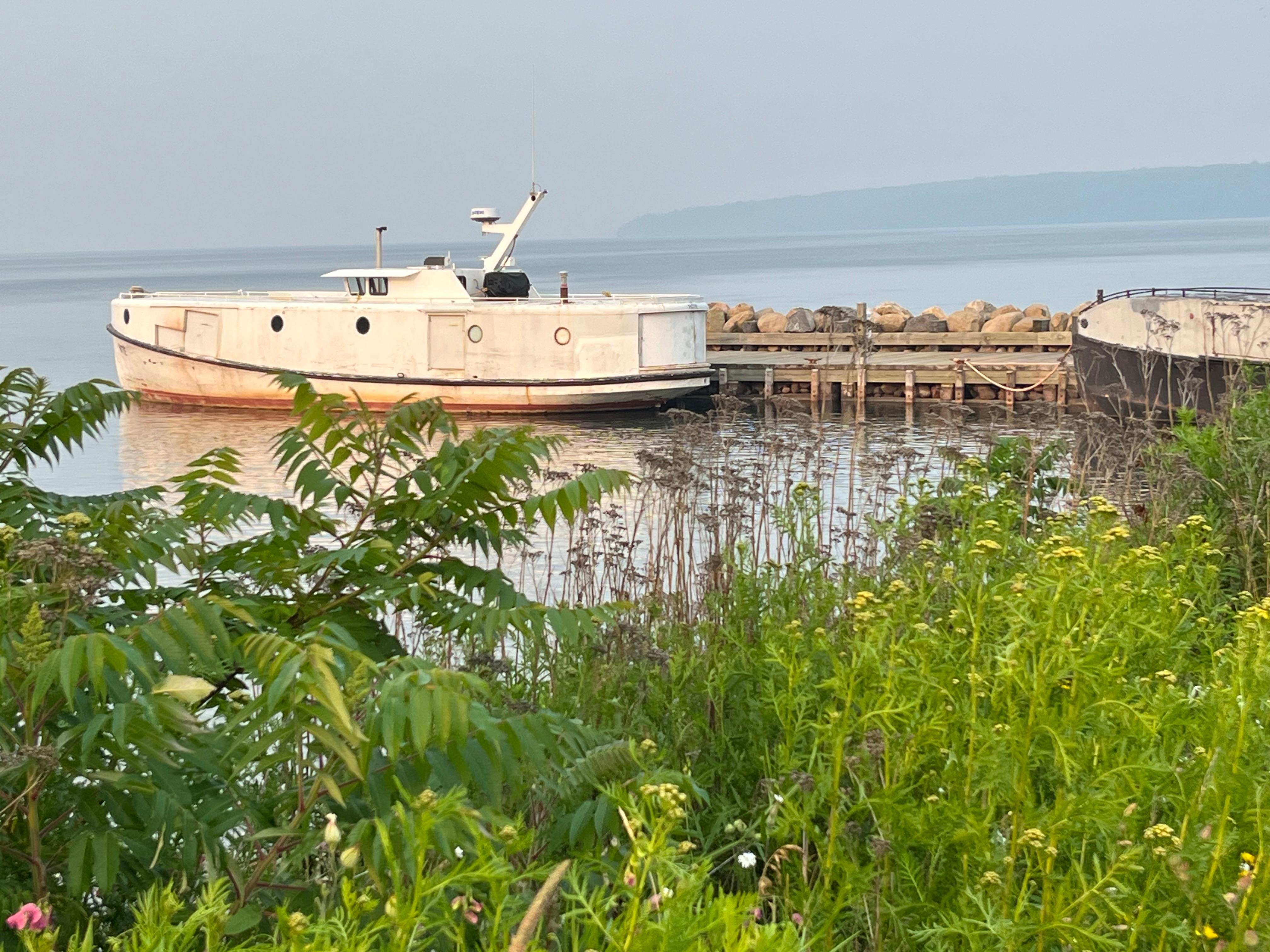 Local fishing boat from walk downhill. 