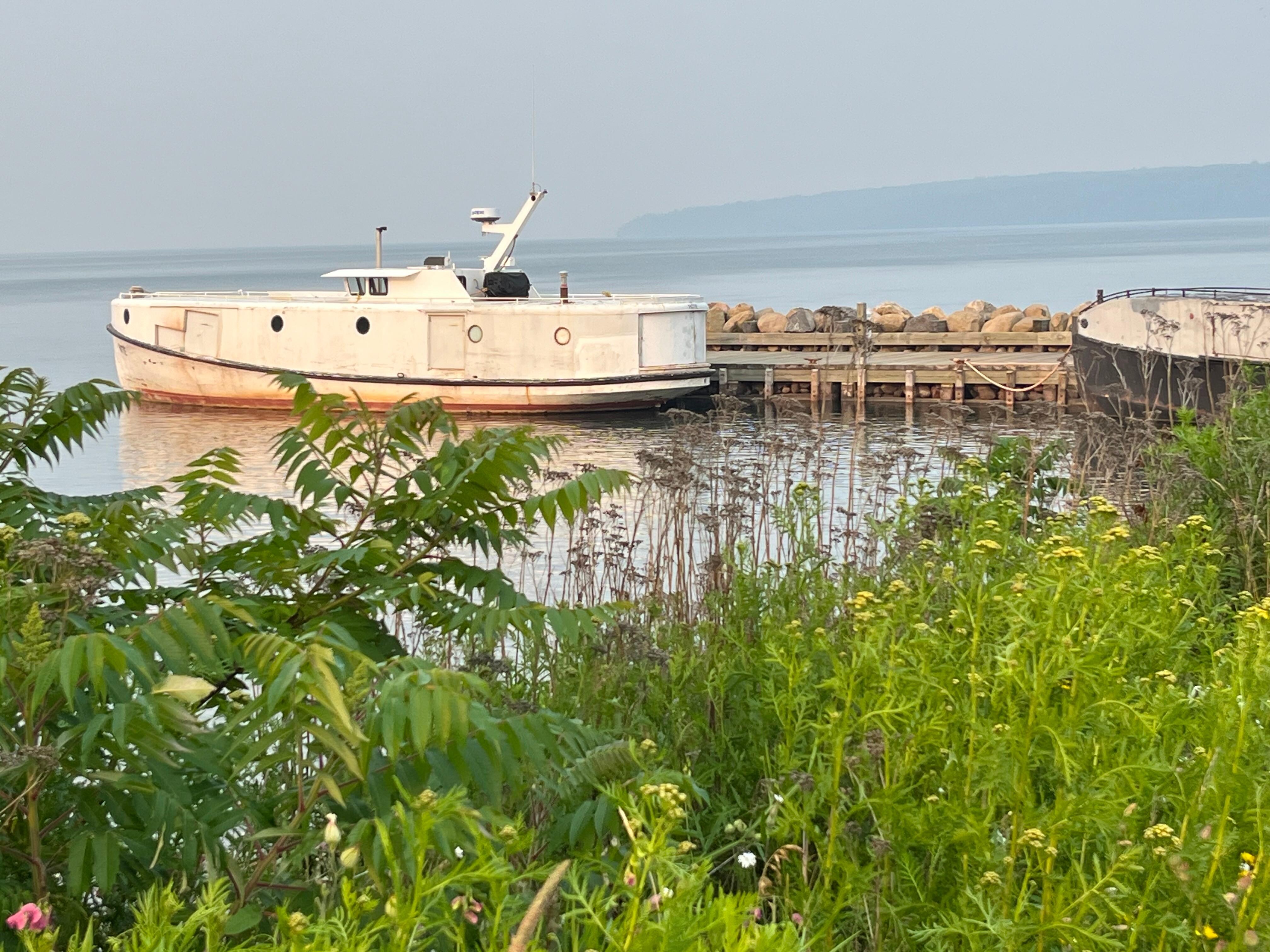 Local fishing boat from walk downhill. 