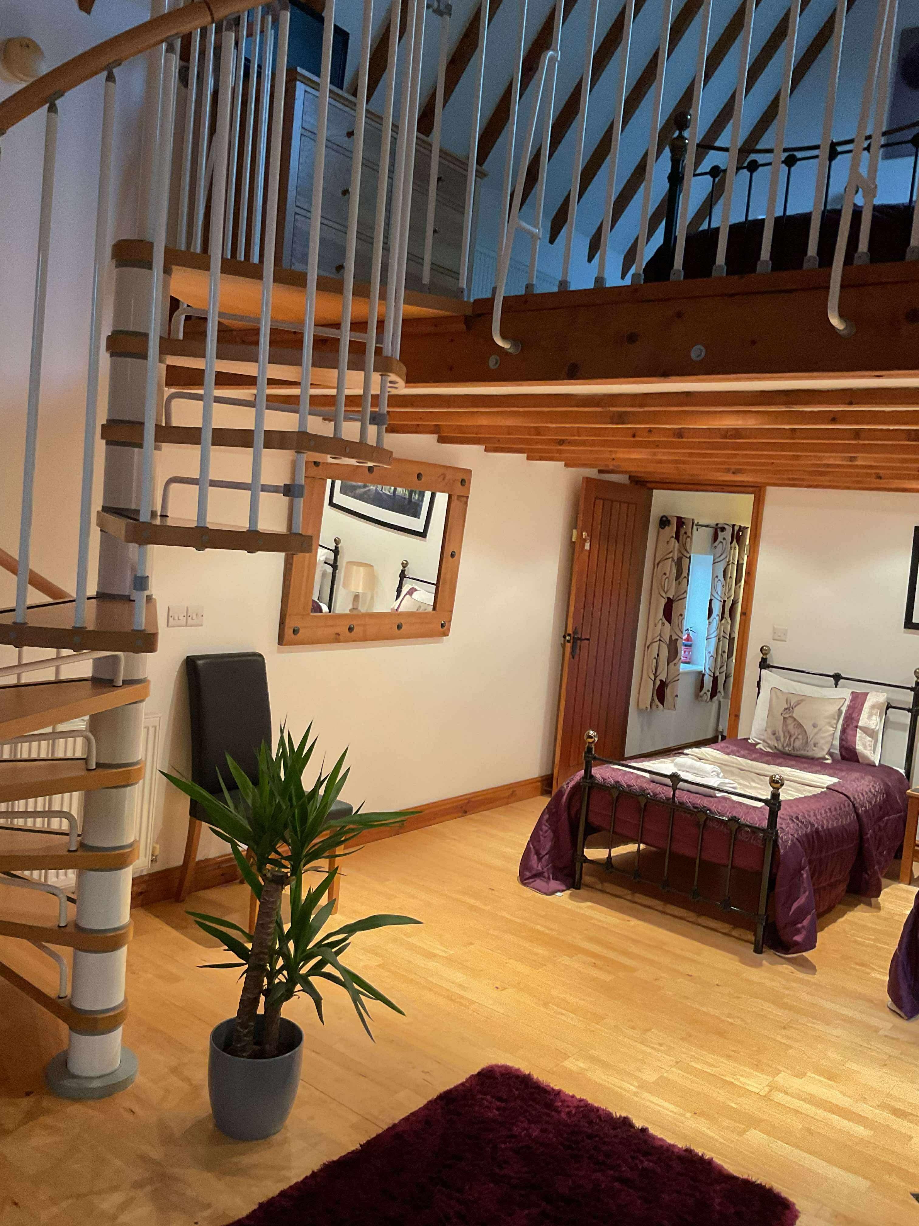 Spiral staircase to the double bedroom which overlooked the fields & cows