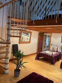 Spiral staircase to the double bedroom which overlooked the fields & cows