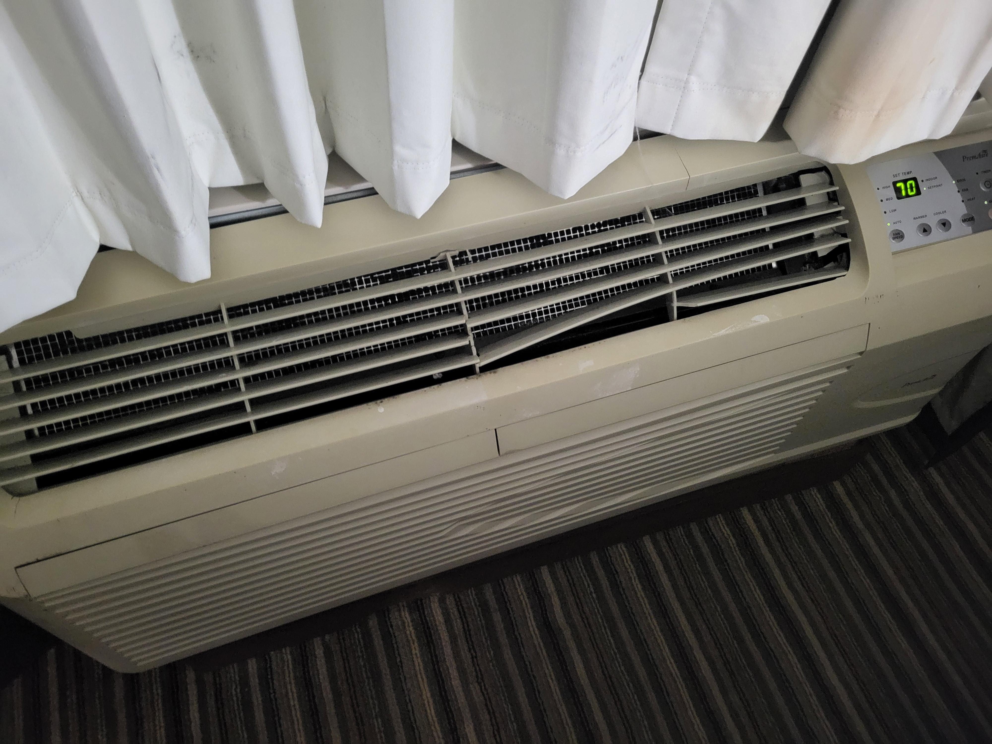 Broken ac unit filled with mold