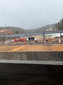 Construction right outside the master window of new ski lift being installed.