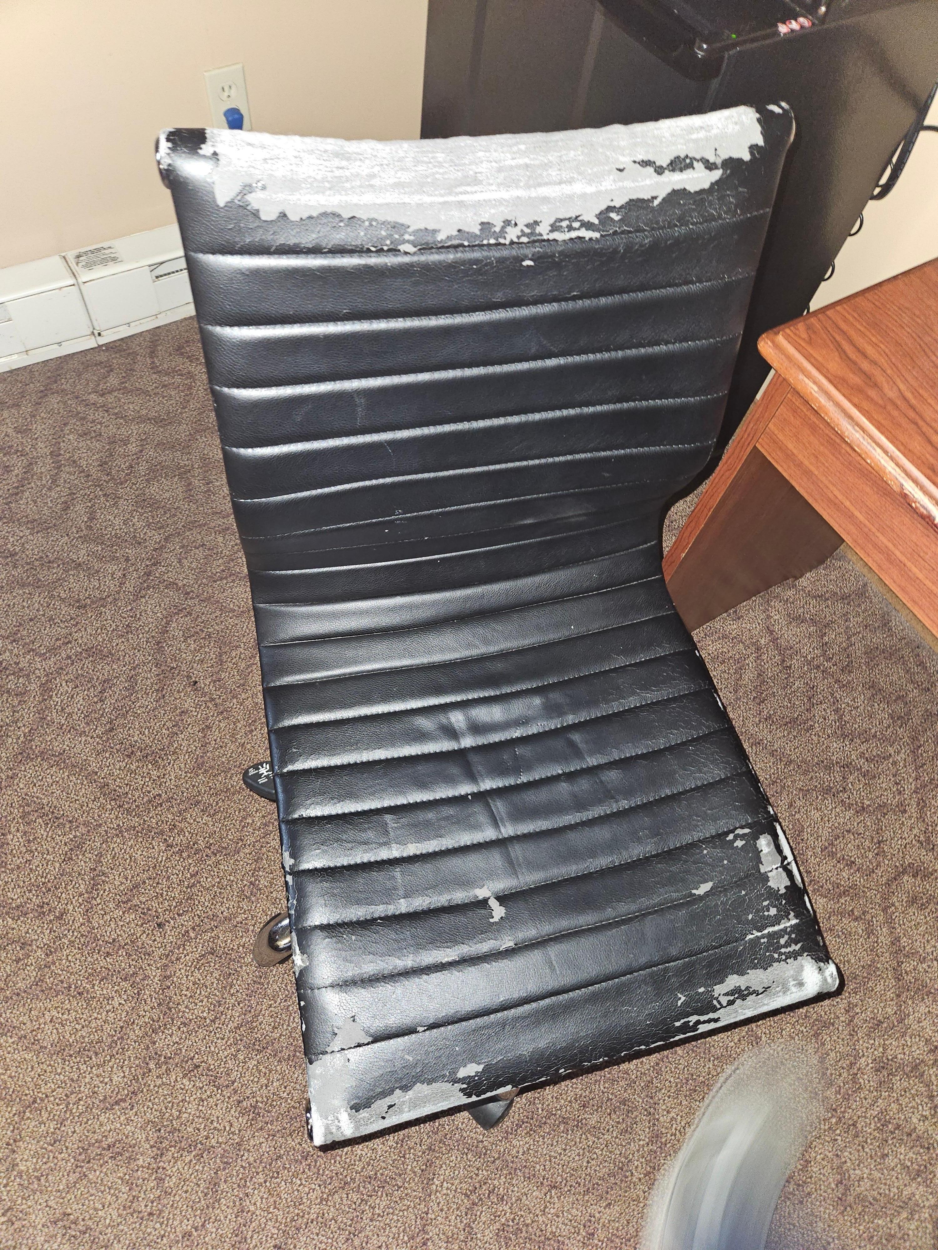 Desk chair I had to use to eat my breakfast (toast) because a homeless lady took over the breakfast room. 