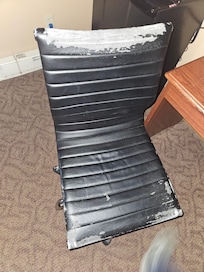 Desk chair I had to use to eat my breakfast (toast) because a homeless lady took over the breakfast room.