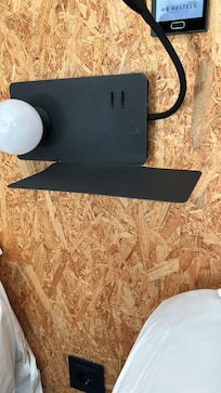 Sharp edged shelf at the head of the bed