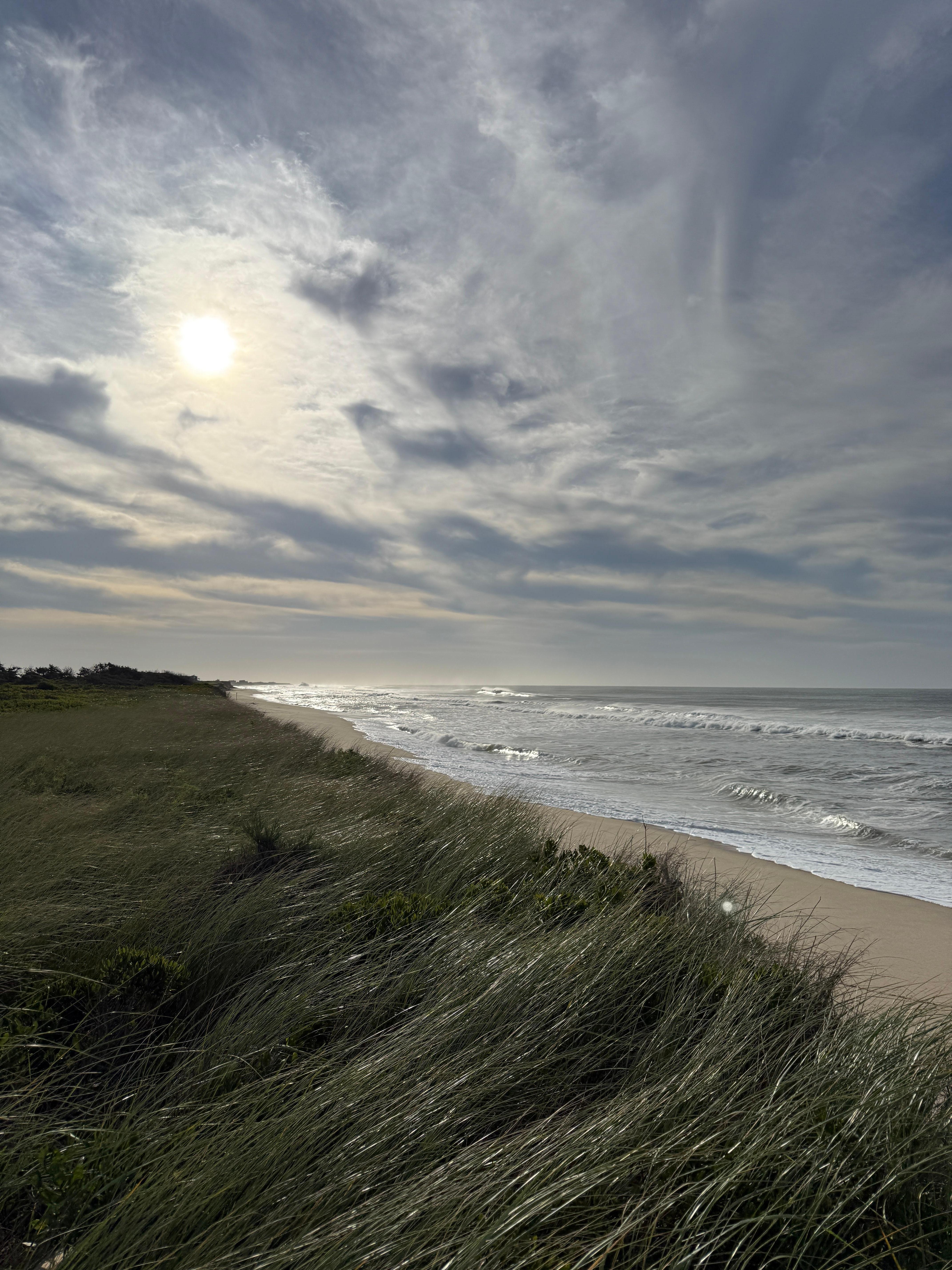 View east from the steps down to the beach (extra swell from a storm) 