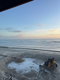 view of construction/beach from balcony.
