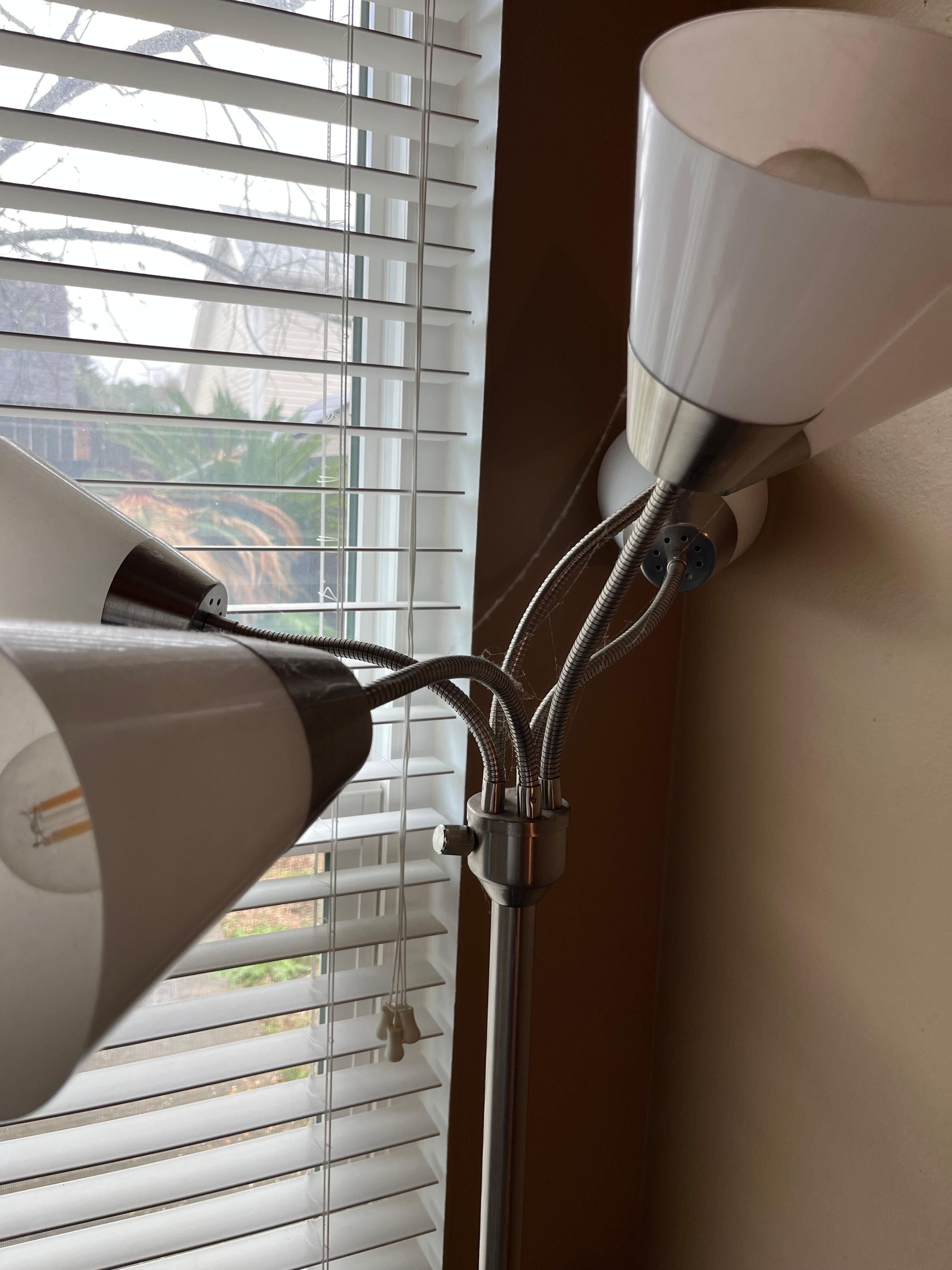 cobwebs and dust on lamp