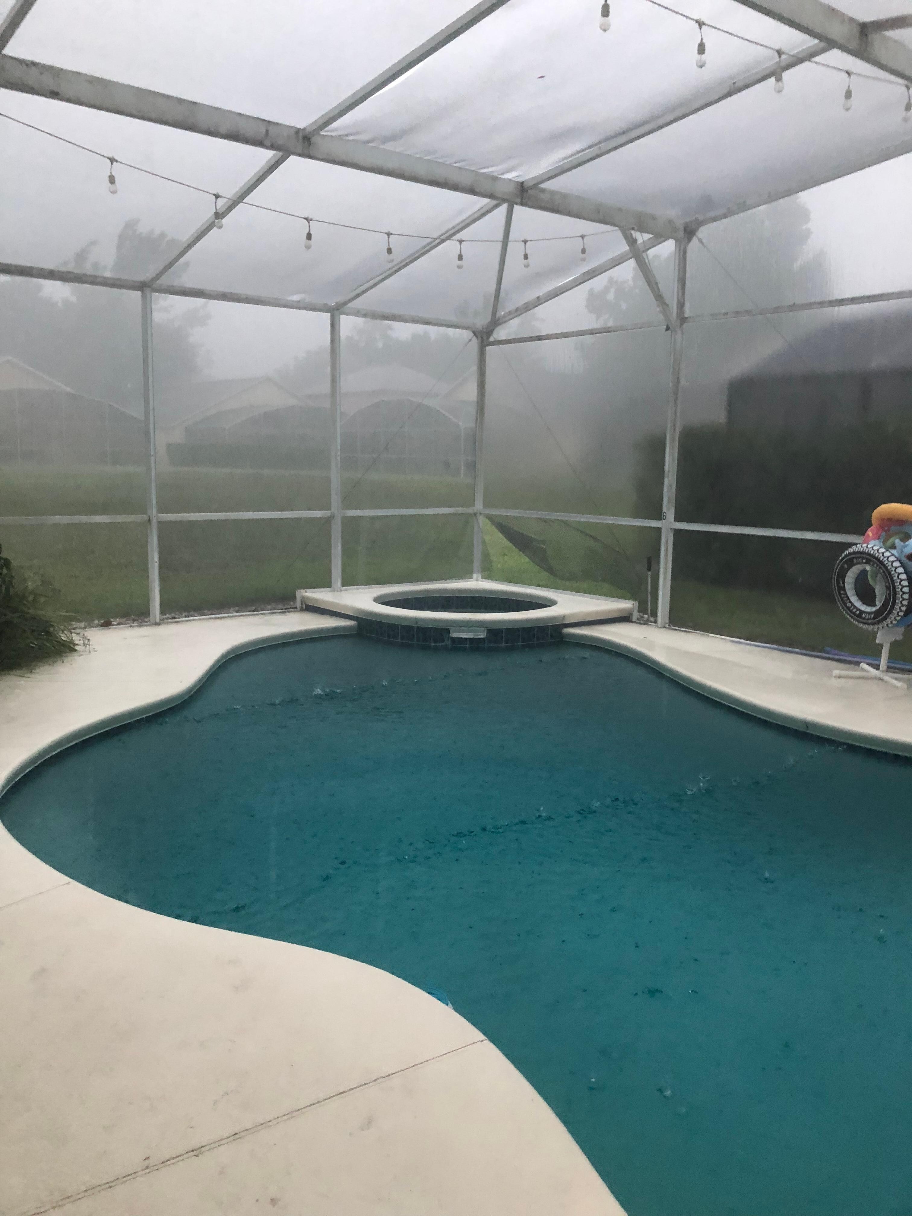 Screens behind jacuzzi flapping in the wind
