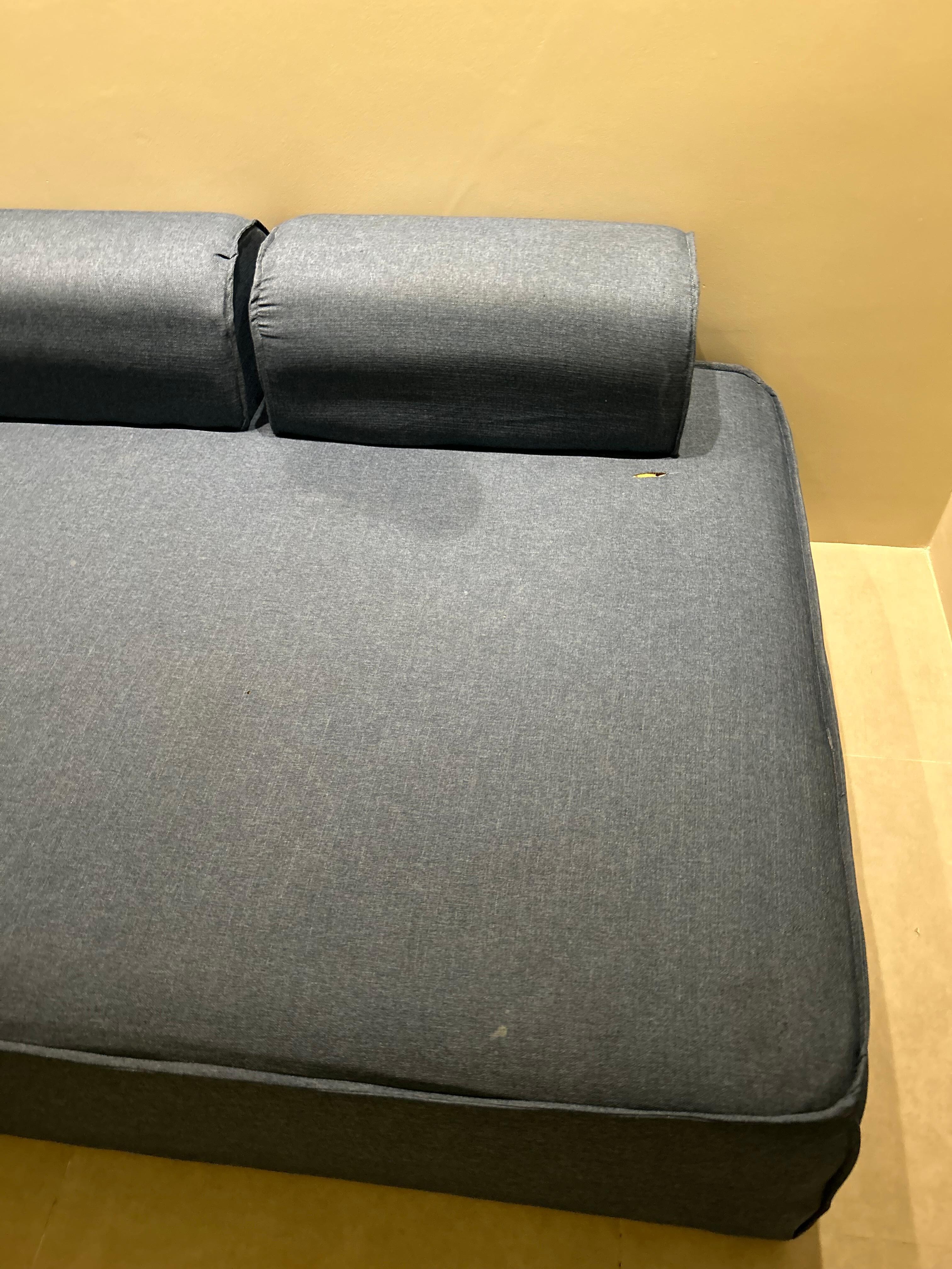 DIRTY COUCH WITH STAINS AND TEARS