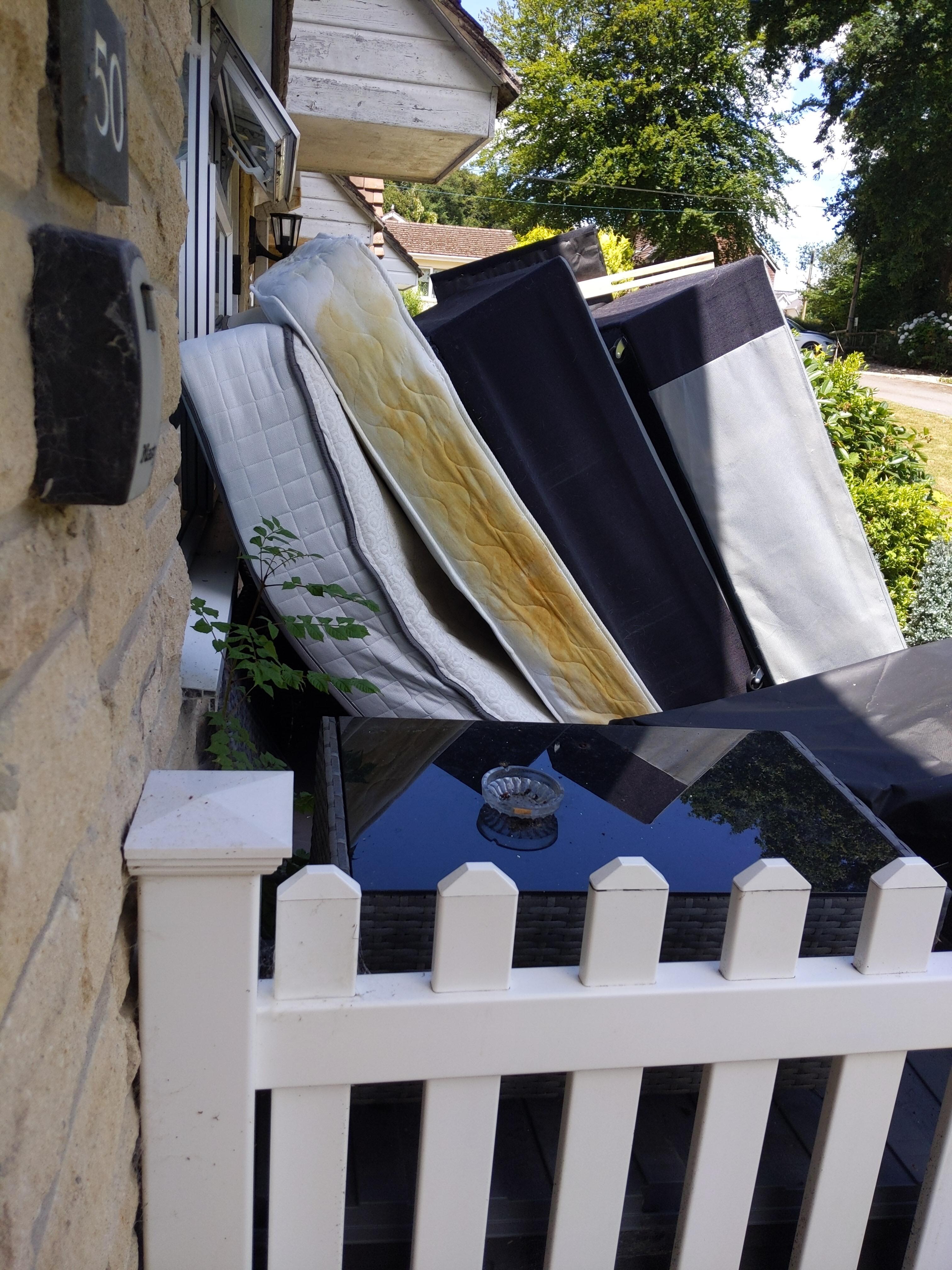 Pead mattress outside adjacent property 