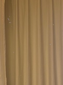 Holes all through the curtains.