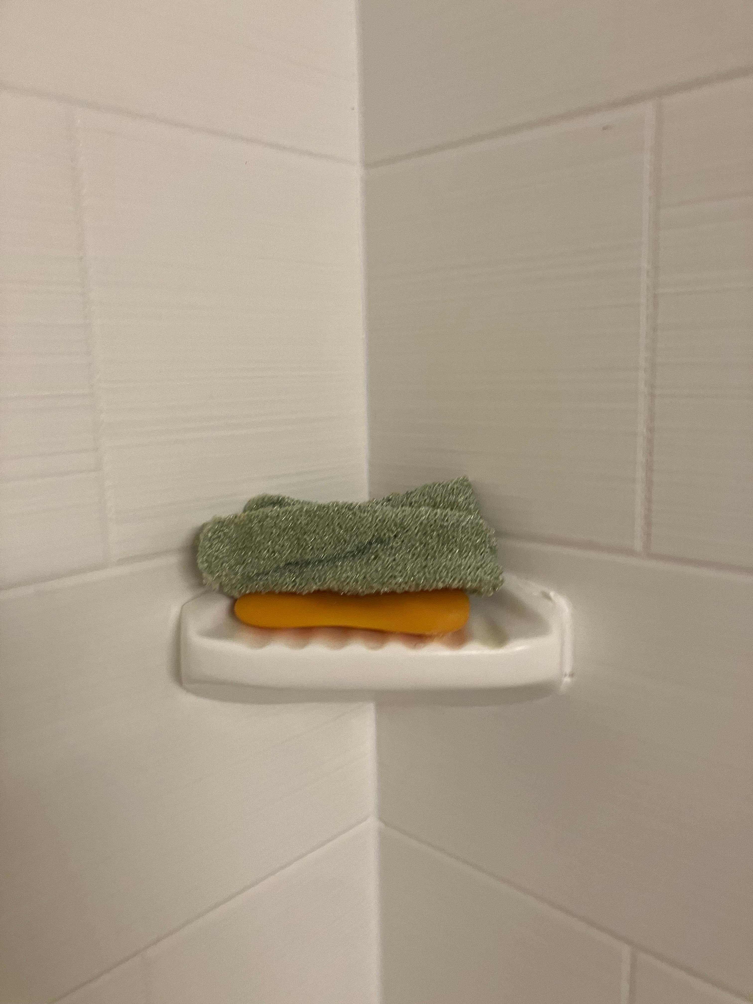 bar of soap and wash cloth left by another guest