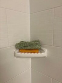 bar of soap and wash cloth left by another guest