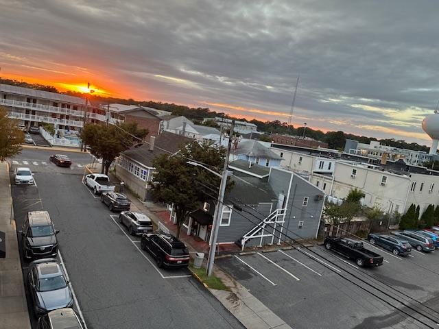 Front balcony sunset on our rainy day