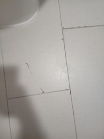 Broken tile in the washroom