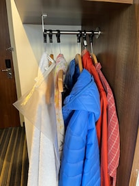 Only six hangers, no drawers and no cupboards in the room
