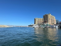 Another great view of Destin Harbor with crab Island just beyond the bridge in the background