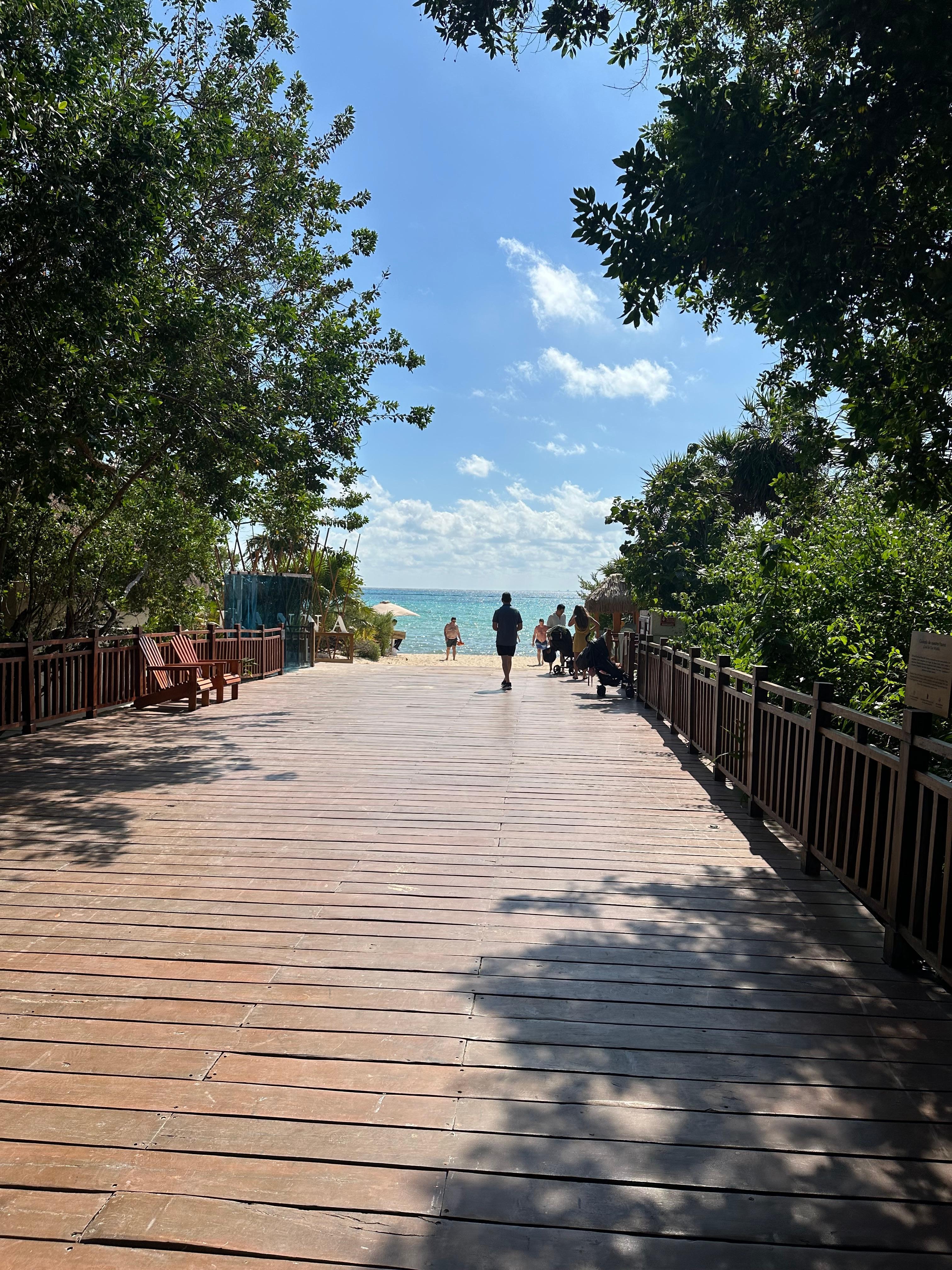 Boardwalk from pools to beach-short & lovely walk.