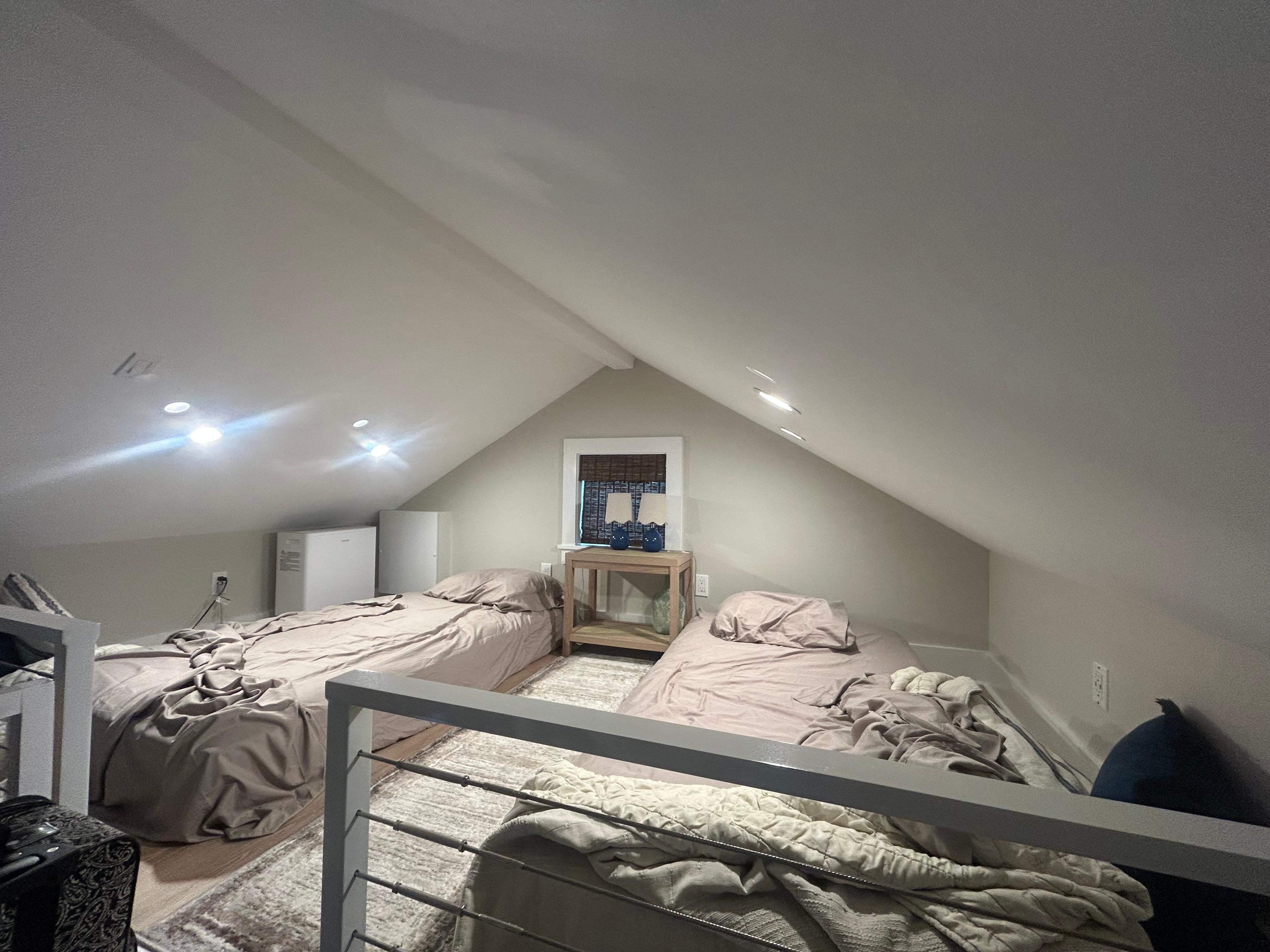 Only issue - Loft has very low ceiling- about 5’6” at the peak - maybe 30” at the sides. Would be great for kids but not good for old folks with bad knees when the description said it was a queen BED not twin mattresses on the floor.  