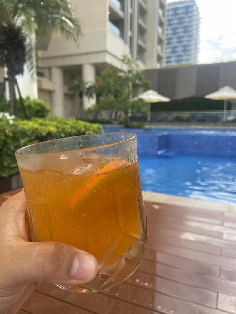 A mai tai by the pool