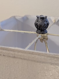 Caked dust in table lamp