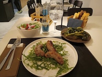 Grilled sausage, sauteed broccoli rabe, mixed salad, with gin and tonic