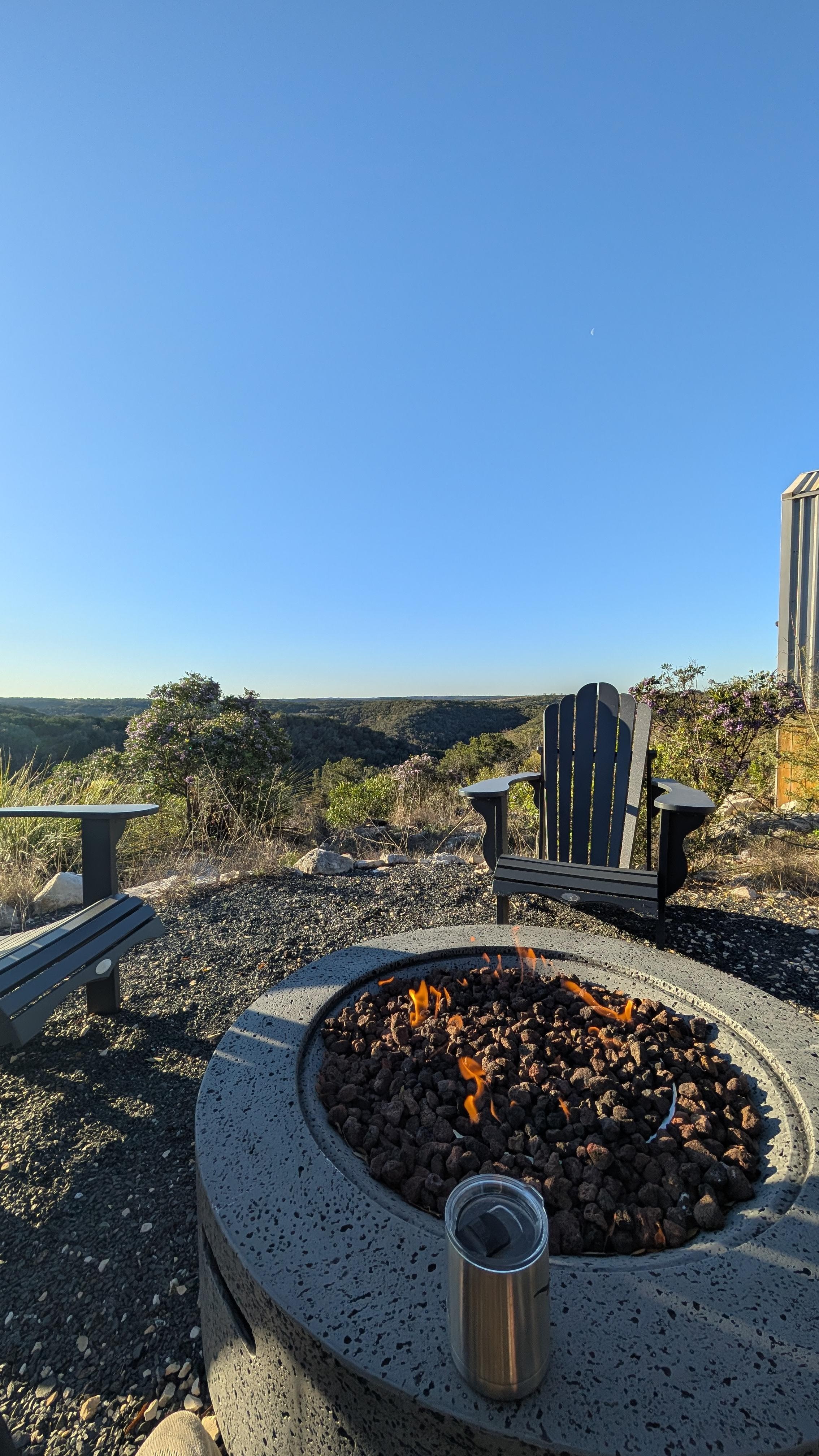 From cozy fire pit off of side of house