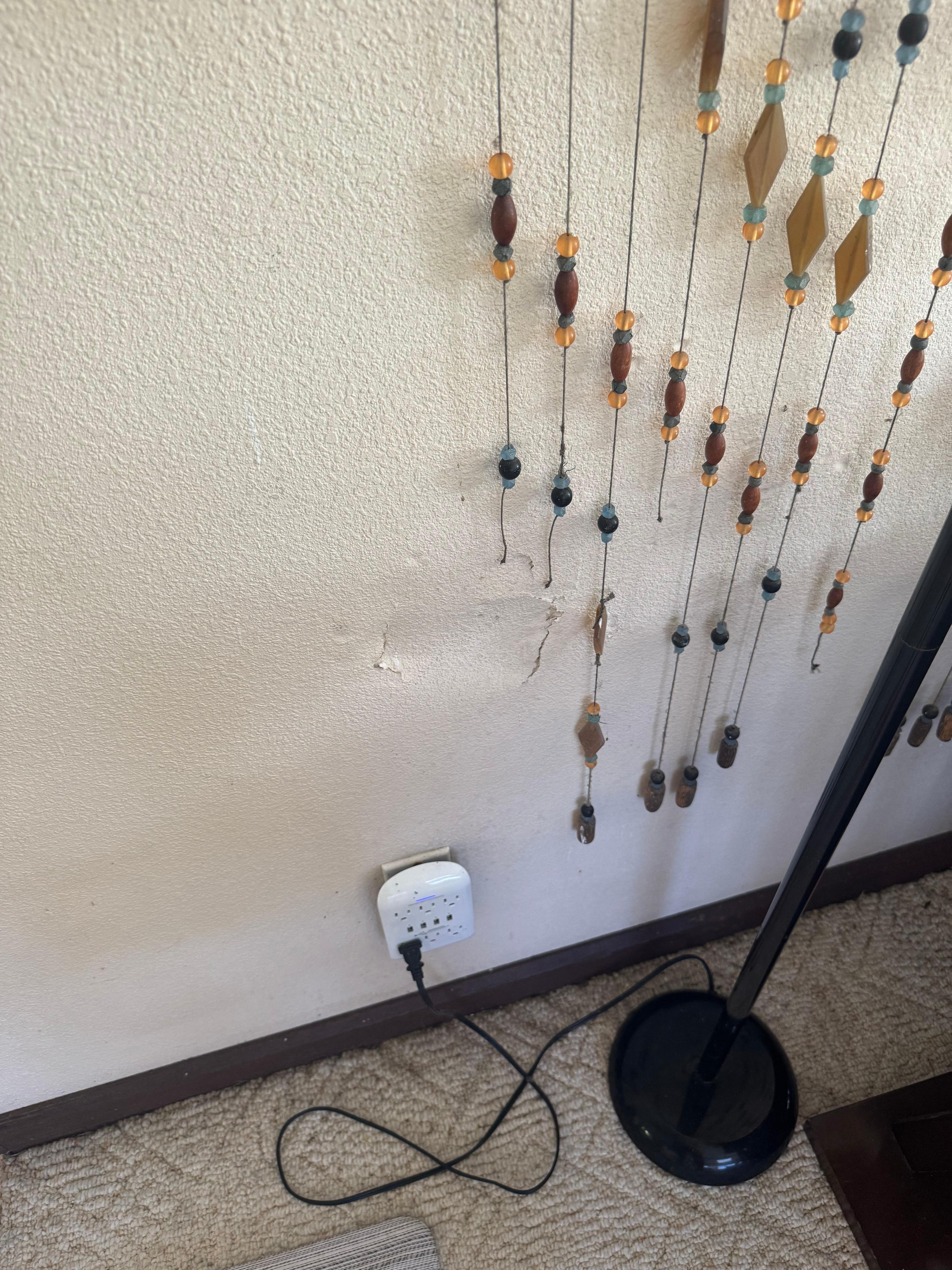 Hole in living room wall