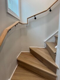 Stair railing-pretty sure that is not up to code