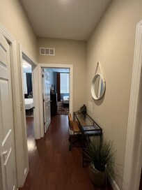 Hallway between common area and bedrooms