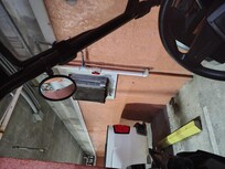 We parked beside this air conditioner meant that was just corroded and nasty and rusty and falling apart