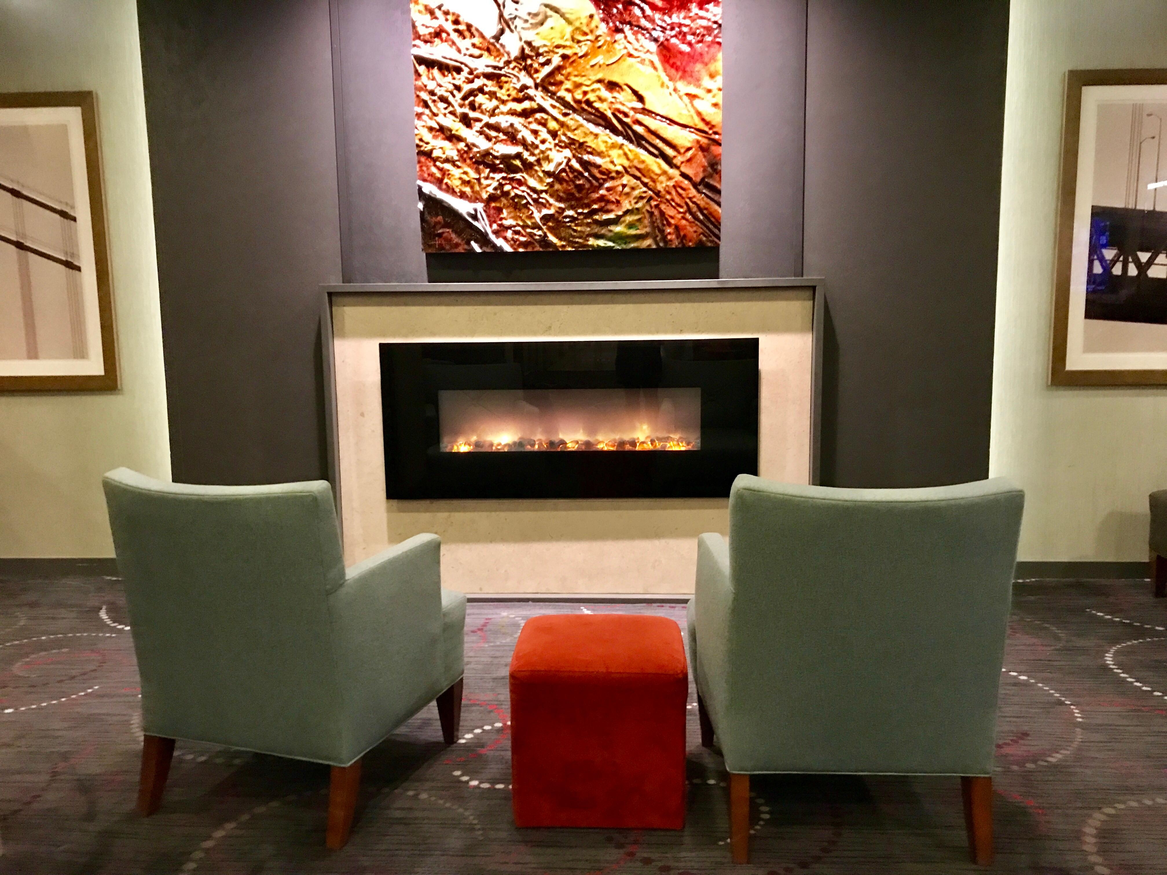 Cozy fireplace in lobby area