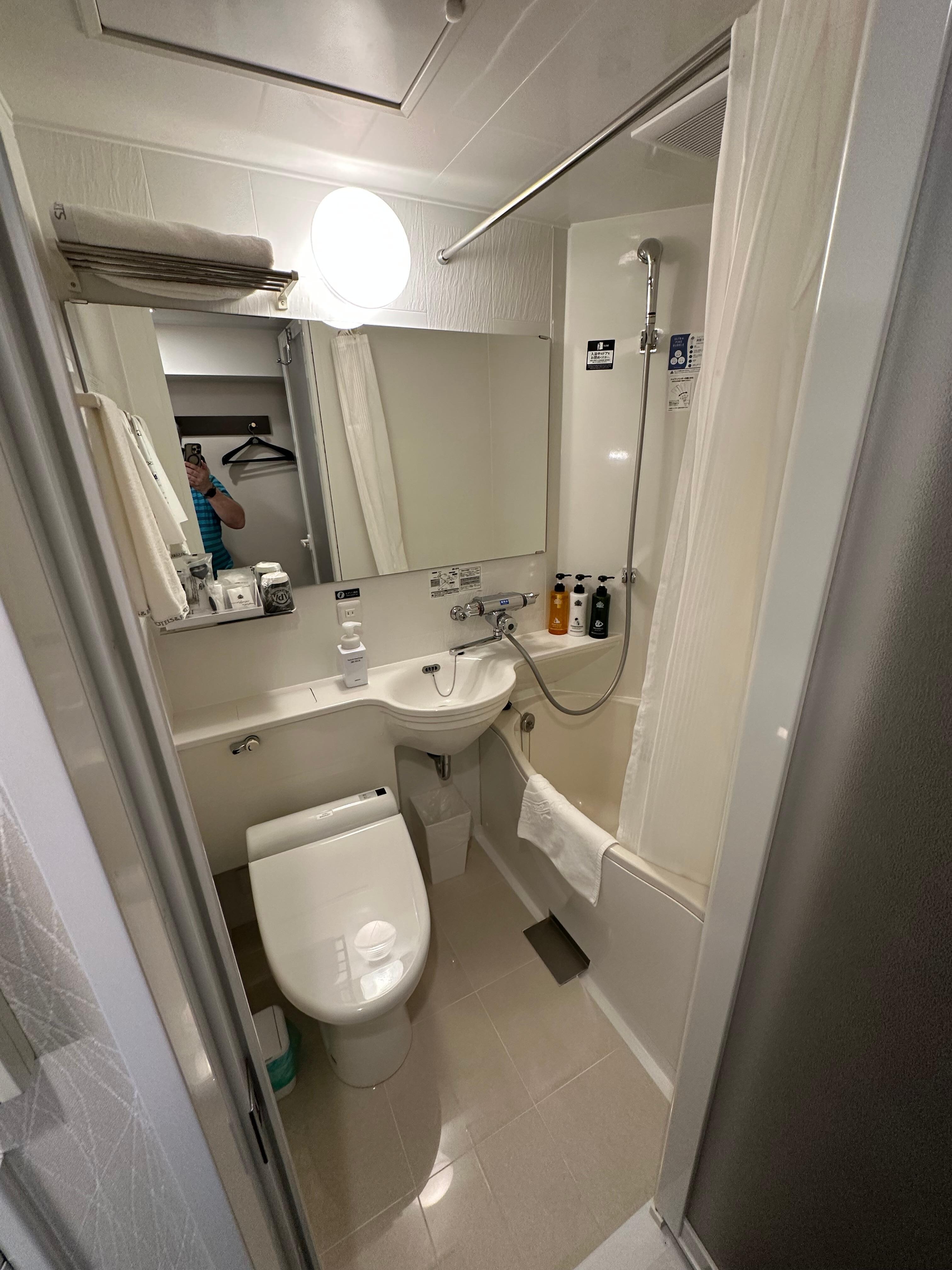 The bathroom, a fancier toilet than I have at my home. 