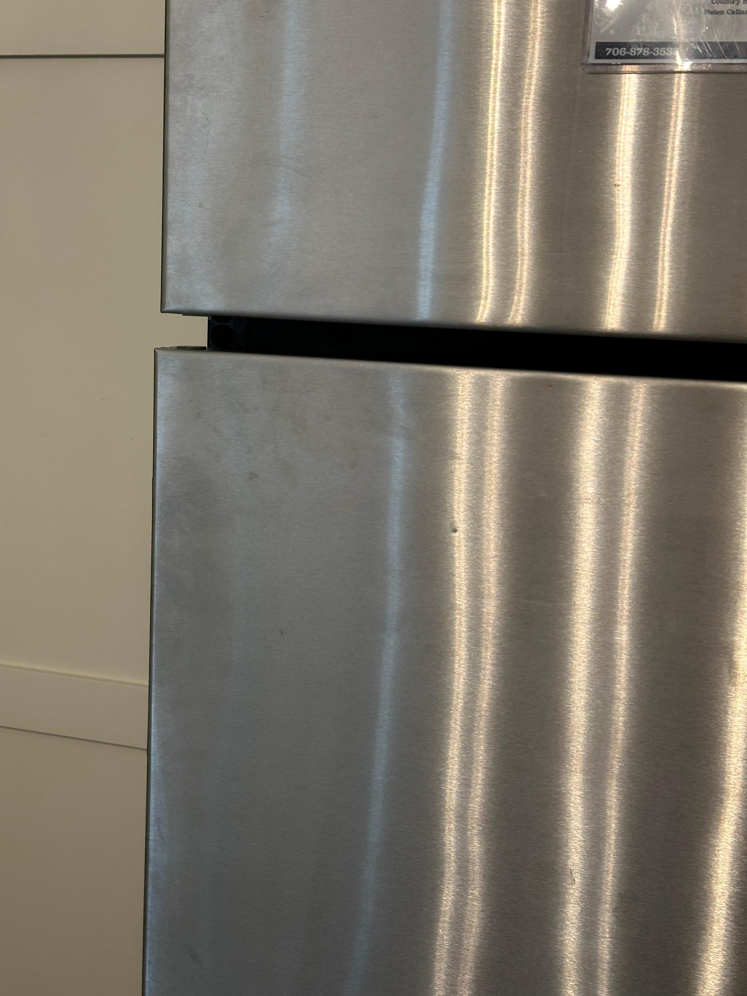 This is how the refrigerator looked upon arrival. It was also sticky. 