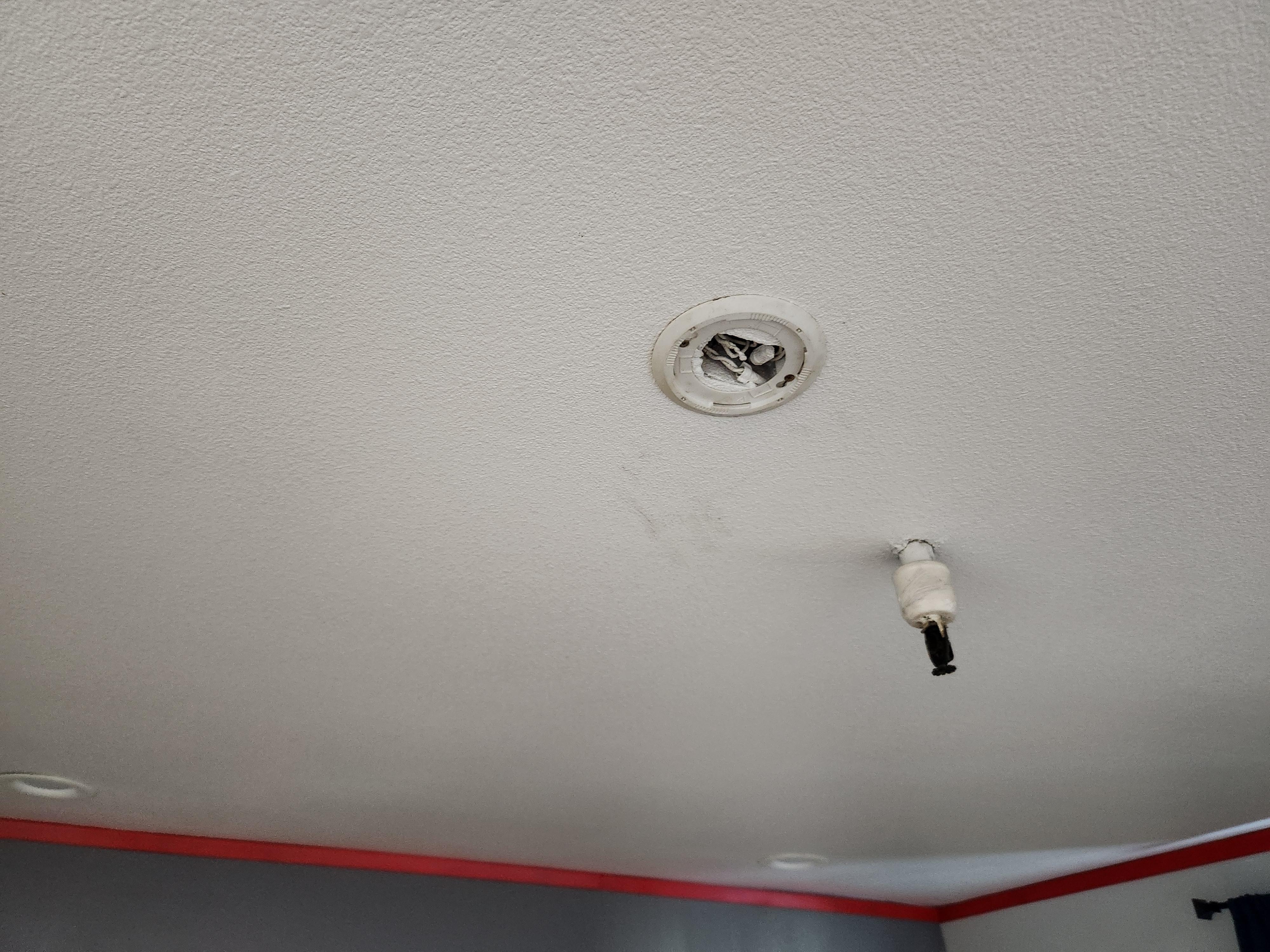 Exposed ceiling wiring where a light should be