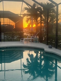Sunset from the house by the pool