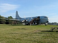 The plane in the front of the hotel that you can go in.